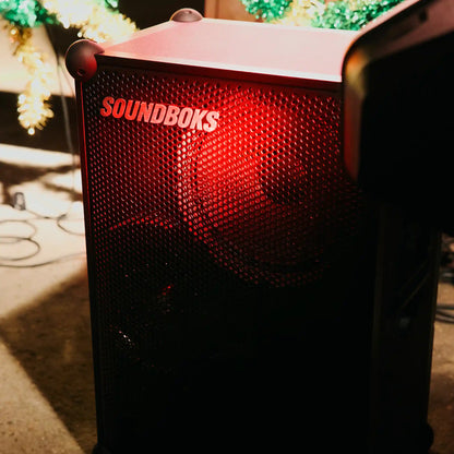 The Soundboks 4 on floor in red light