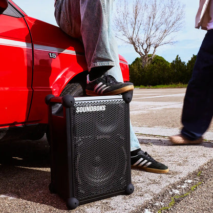 Person resting their foot on the Soundboks Mix